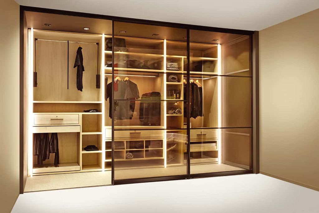 Walk-In Wardrobe With Tinted Glass Sliding Doors